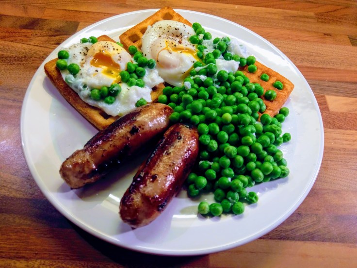 sausage-poached-egg-potato-waffles-peas-angled